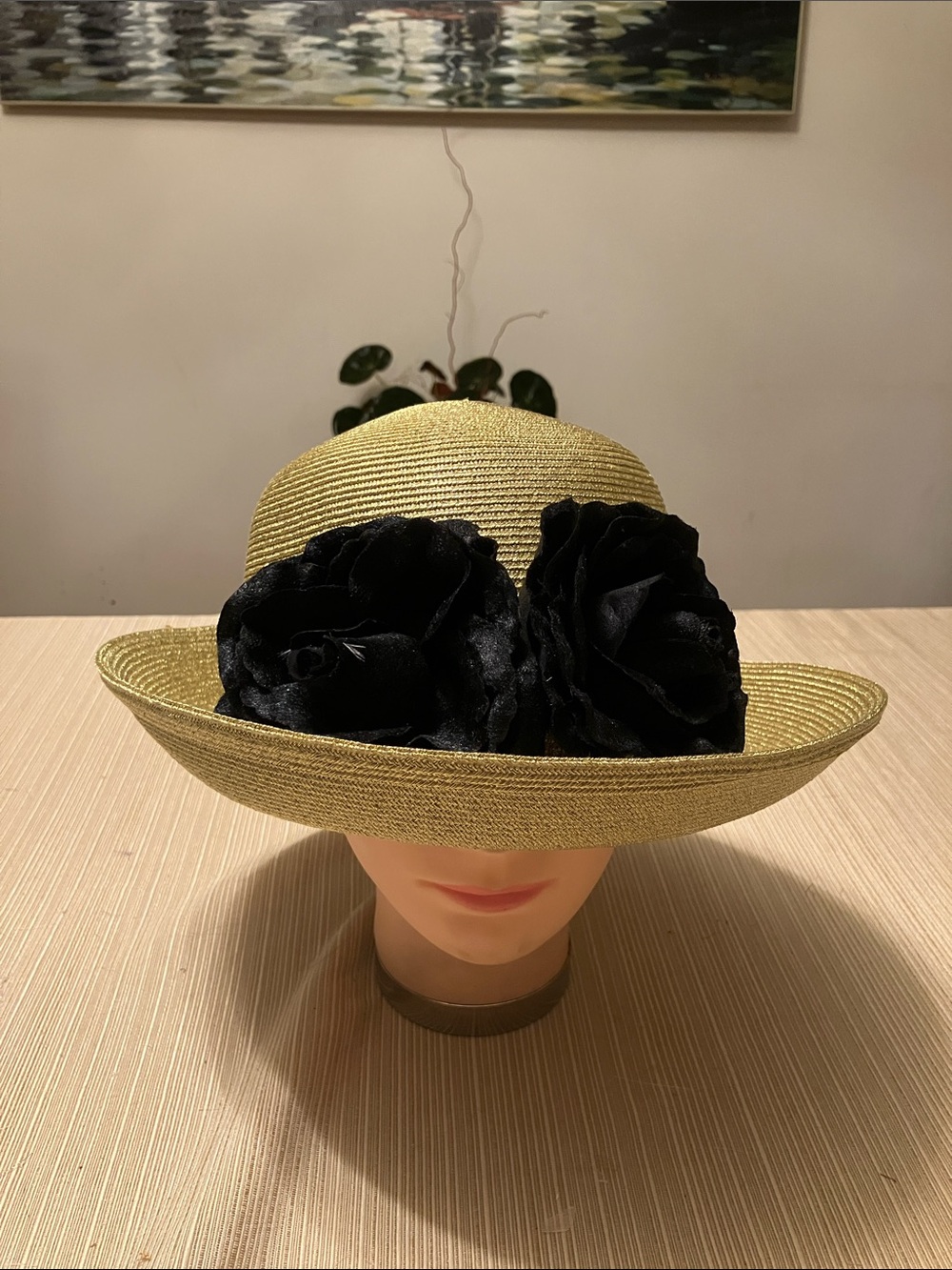 Chic Metallic Gold Hat with Black Velvet Floral Accents